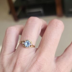 Elegant 14K Gold Ring with Light Blue Stone